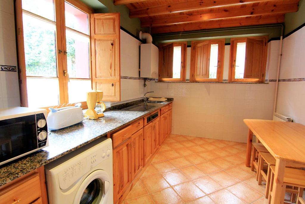 Apartamentos Rurales "Les Escueles De Collia" Camera foto